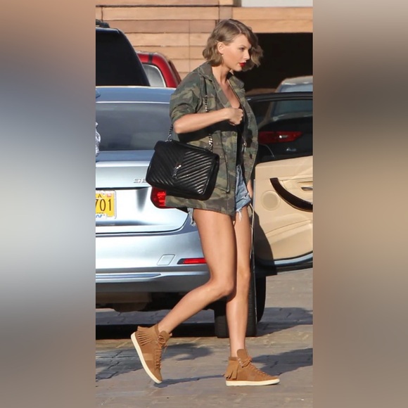 The sneakers are the ASH Marlow Fringe Lace Up High Top Sneakers. Size 38 - Picture 16 of 16